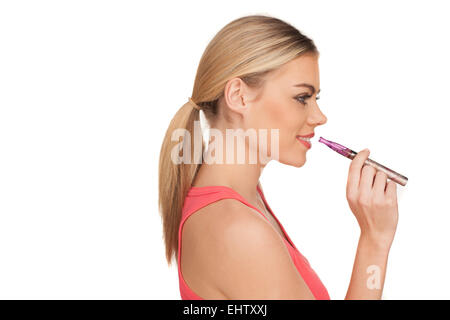 Jeune femme Smokin Cigarette électrique Banque D'Images