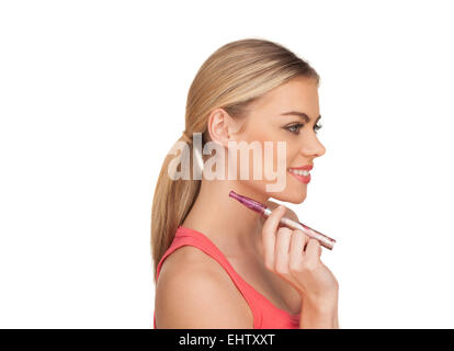 Jeune femme Smokin Cigarette électrique Banque D'Images