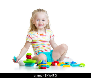 Kid fille jouant jouets couleur Banque D'Images