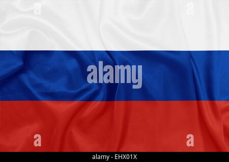 La Russie - en agitant le drapeau national sur la texture de la soie Banque D'Images