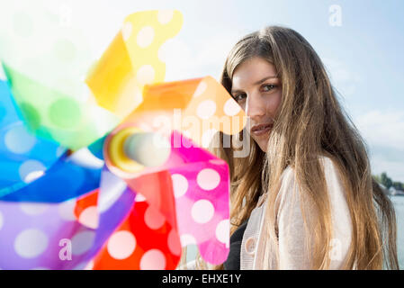 Close up portrait of young woman toy moulin Banque D'Images