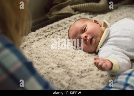 Baby Boy lying on blanket Banque D'Images