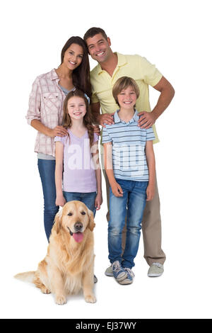 Happy Family standing with dog Banque D'Images