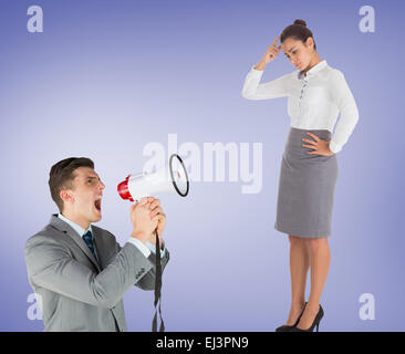 Composite image of businessman with megaphone Banque D'Images
