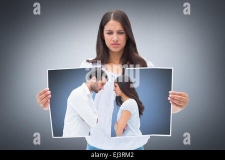 Image composite de angry couple facing off après l'argument Banque D'Images