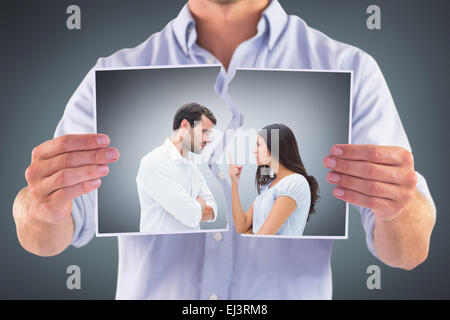 Image composite de angry couple facing off durant les plaidoiries, Banque D'Images