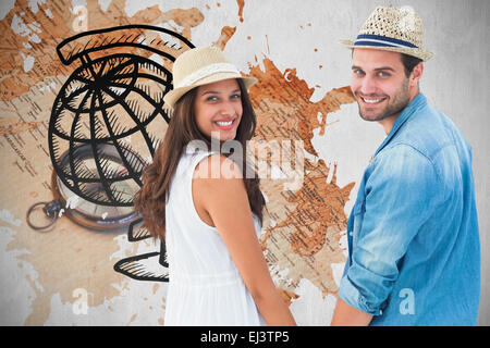 Libre de hipster couple holding hands and smiling at camera Banque D'Images