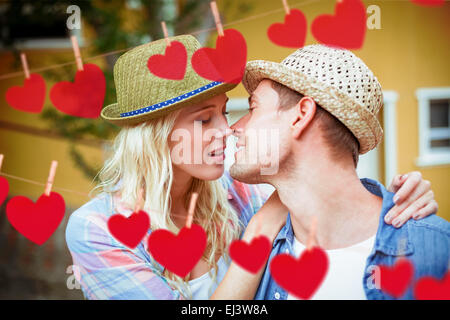 Image composite de la hanche de jeune couple sur le point de baiser Banque D'Images