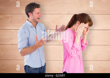 Image composite de man giving woman un mal de tête Banque D'Images