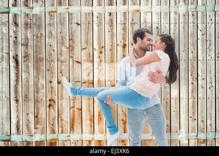 Image composite de l'attractive young couple having fun Banque D'Images