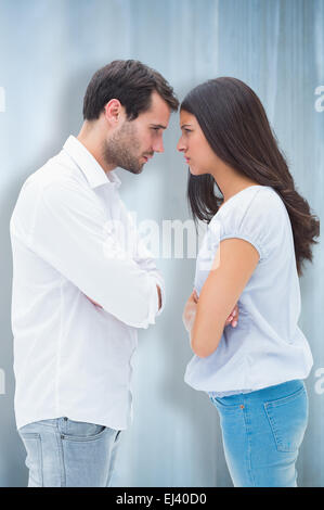 Image composite de angry couple facing off après l'argument Banque D'Images