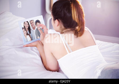 Composite image of smiling family Banque D'Images