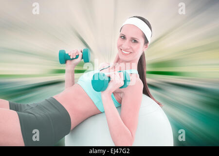 Composite image of computing application icons sur fitness ball Banque D'Images