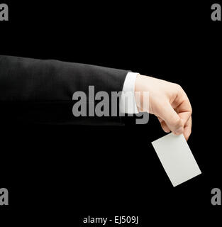 Homme de race blanche dans la main d'un tailleur isolé Banque D'Images