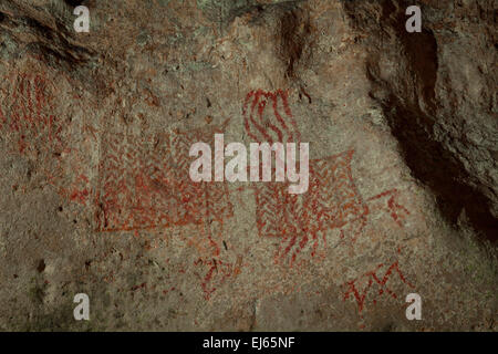 Peinture ancienne des grottes sur le site de sépulture préhistorique de Gua Harimau (littéralement : grotte du tigre) à Padangbindu, Ogan Komering Ulu, Sumatra Sud, Indonésie. Banque D'Images