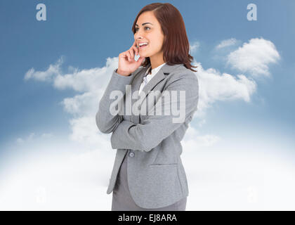 Composite image of businesswoman Banque D'Images