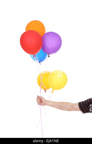 La main avec des ballons colorés isolé sur fond blanc Banque D'Images