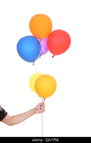 La main avec des ballons colorés isolé sur fond blanc Banque D'Images