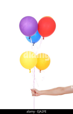 La main avec des ballons colorés isolé sur fond blanc Banque D'Images