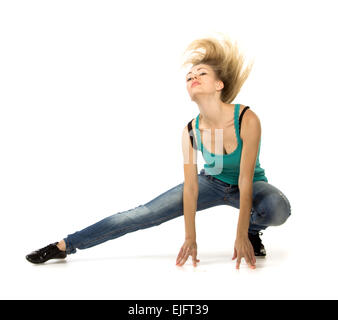 Woman doing stretching exercice sur fond blanc Banque D'Images