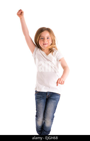 Kid girl blonde haut vent saut en retrait sur des cheveux denim jeans à fond blanc Banque D'Images