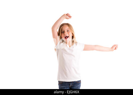 Kid girl blonde haut vent saut en retrait sur des cheveux denim jeans à fond blanc Banque D'Images