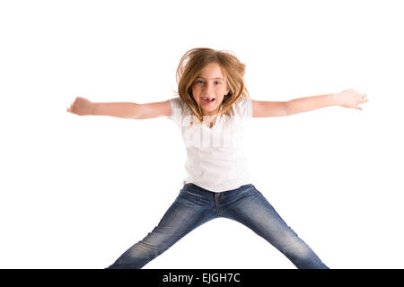 Kid girl blonde haut vent saut en retrait sur des cheveux denim jeans à fond blanc Banque D'Images