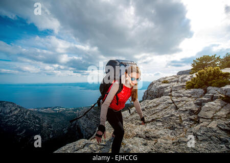 Les jeunes d'alpiniste sur l'île de haut Banque D'Images