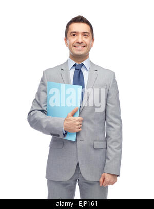 Happy businessman holding folder Banque D'Images