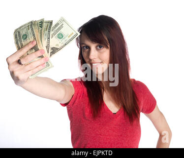Smiling Woman Holding Fan de 20 US Dollar Bills Banque D'Images