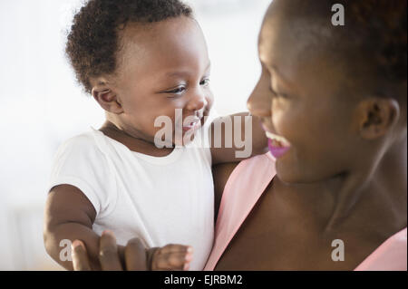 Close up of Black mother and son smiling Banque D'Images