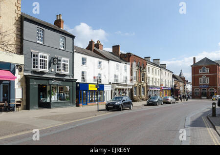 Boutiques de High Street Market Harborough Banque D'Images