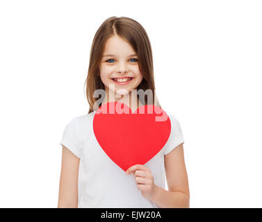 Smiling little Girl with red heart Banque D'Images