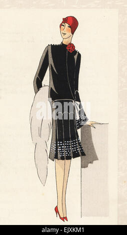 Femme en robe d'après-midi de crêpe noir avec étole de fourrure, 1928. Banque D'Images