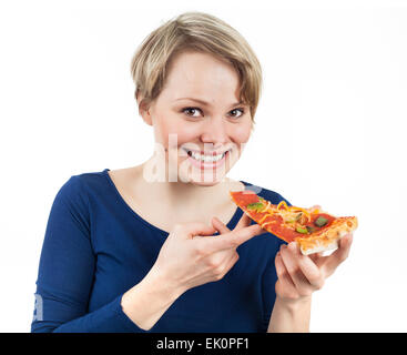 Jeune femme tenant une tranche de pizza et souriant, isolated on white Banque D'Images