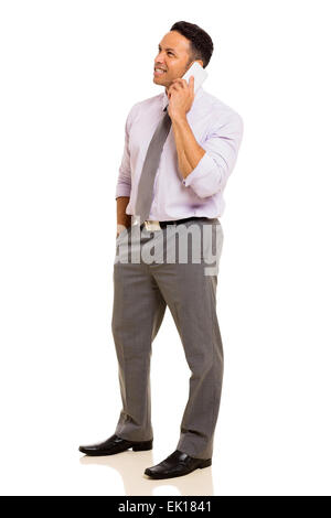 Vue latérale du mid age businessman talking on mobile phone Banque D'Images