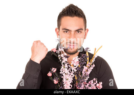 Beau Jeune homme tenant un bouquet de fleurs Banque D'Images