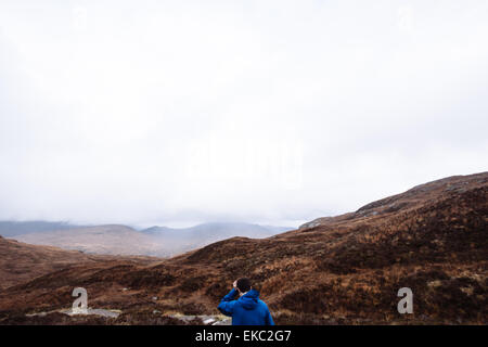 Randonnée homme, Glencoe, Highlands, Scotland Banque D'Images