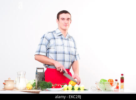 Portrait d'un jeune homme, faire de délicieux repas Banque D'Images