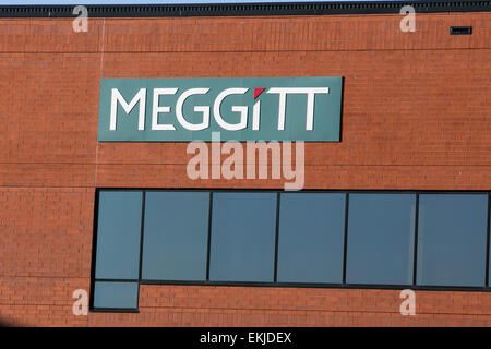 Un logo affiche à l'extérieur de l'extérieur d'un bâtiment occupé par Meggitt. Banque D'Images