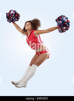 Cheerleader girl jumping Banque D'Images