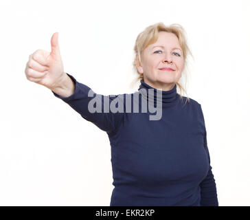 Une femme plus âgée serait showing Thumbs up Banque D'Images