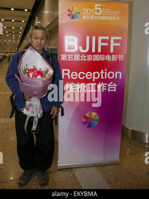 Beijing, Chine. 14 avr, 2015. Directeur sud-coréen Kim Ki-duk, également jury du 5ème Festival International du Film de Beijing, arrive à l'Aéroport International de la Capitale à Beijing, capitale de Chine, le 14 avril 2015. Credit : Wang Shen/Xinhua/Alamy Live News Banque D'Images