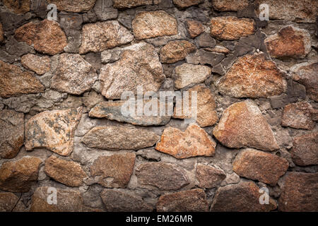 Mur. Pierre de granit naturel texture background. Rugueux et rouillé. Close-up, macro Banque D'Images