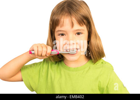 Portrait d'une petite fille se brosser les dents Banque D'Images