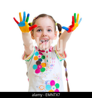 Petite fille joyeuse avec les mains dans la peinture sur white Banque D'Images