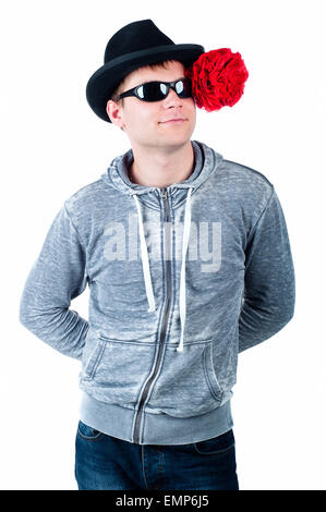 Jeune homme en chapeau avec lunettes isolé Banque D'Images