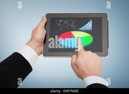 Close up of man hands touching tablet pc Banque D'Images