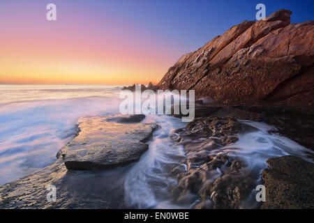 Azkorri beach au coucher du soleil Banque D'Images