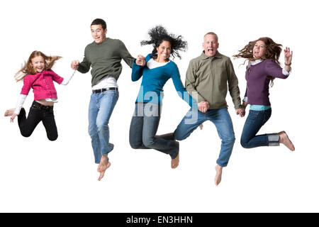 Studio shot of family et le saut Banque D'Images